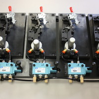 Semi-Automatic work holding fixture with pneumatic clamps. Semi-Automatic work holding fixture with pneumatic clamps.