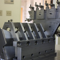 Work holding fixture for 5-axis milling operation. Work holding fixture for 5-axis milling operation.