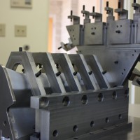 Work holding fixture for 5-axis milling operation. Work holding fixture for 5-axis milling operation.