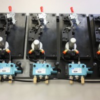 Semi-Automatic work holding fixture with pneumatic clamps. Semi-Automatic work holding fixture with pneumatic clamps.