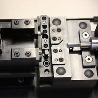 Precision machined components assembled to work as an insertion fixture. Precision machined components assembled to work as an insertion fixture.